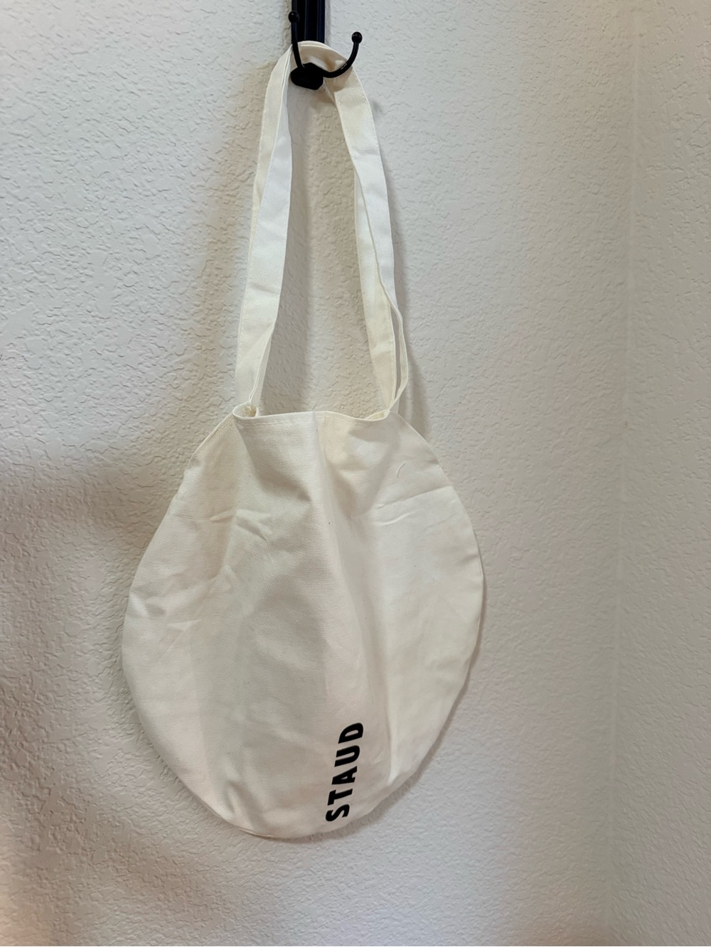 STAUD Cream Round Canvas Tote with Black Logo